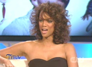 Illustration for article titled Tyra Unveils Real Hair; Interviews Evil Leprechaun